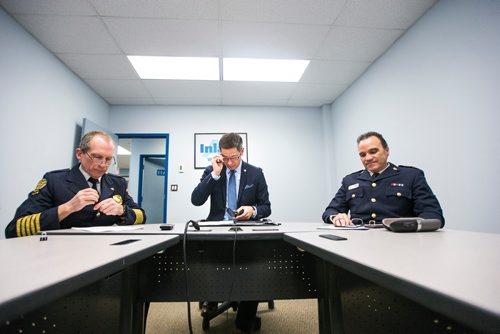 MIKAELA MACKENZIE / WINNIPEG FREE PRESS
Winnipeg Fire & Paramedic Service Chief John Lane (left), Mayor Brian Bowman, and Winnipeg Police Chief Danny Smyth prepare to videoconference with the parliamentary Standing Committee on Health, which is currently studying the impacts of methamphetamine abuse in Canada, at Inland AV in Winnipeg on Tuesday, Dec. 11, 2018. 
Winnipeg Free Press 2018.