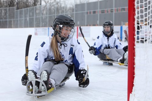 RUTH BONNEVILLE / WINNIPEG FREE PRESS


Kassidy Paluck a member of the Collège Jeanne-Sauvé hockey team plays sledge hockey with her teammates on the newly opened fully accessible Jumpstart outdoor rink at Dakota Community Centre Tuesday. 
See press release for more info.




Dec 11th, 2018