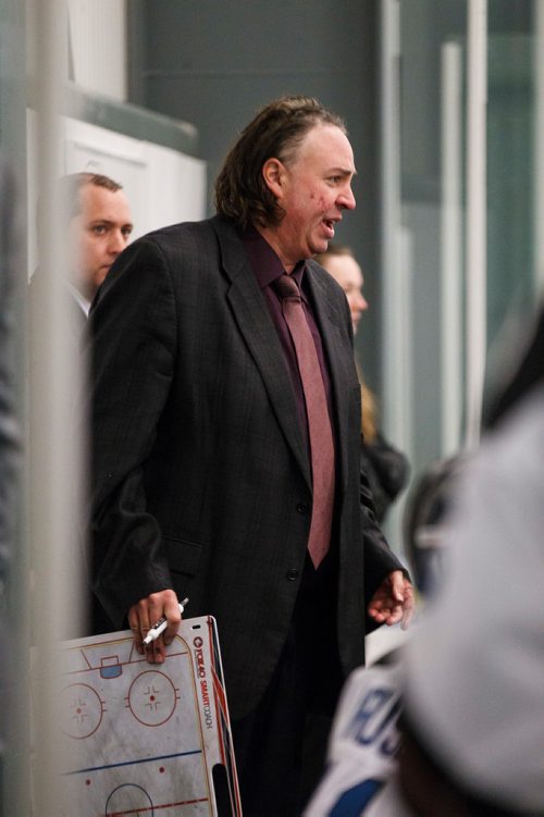 MIKE DEAL / WINNIPEG FREE PRESS
The Swan Valley Stampeders' head coach Barry Wolff talks to players on the bench during the second period of a regular MJHL season game against the Portage Terriers  being held at the Seven Oaks Sportsplex Tuesday afternoon.
181211 - Tuesday, December 11, 2018.