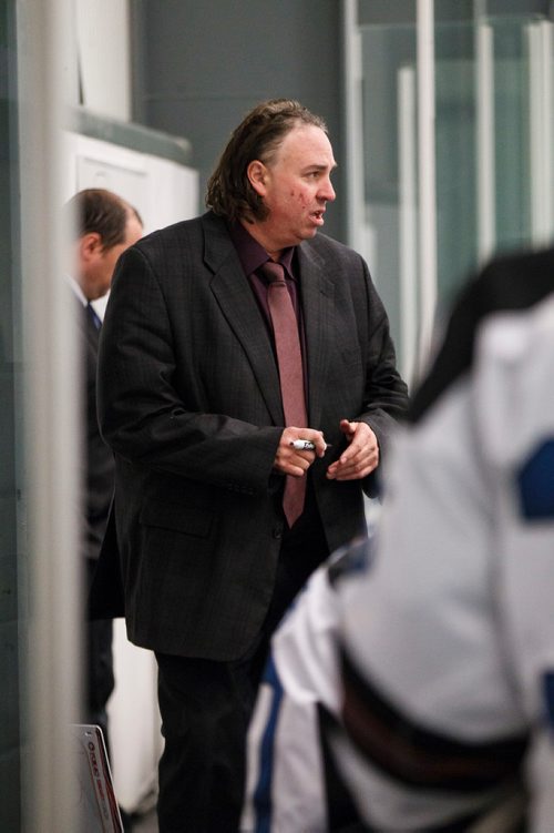 MIKE DEAL / WINNIPEG FREE PRESS
The Swan Valley Stampeders' head coach Barry Wolff talks to players on the bench during the second period of a regular MJHL season game against the Portage Terriers  being held at the Seven Oaks Sportsplex Tuesday afternoon.
181211 - Tuesday, December 11, 2018.