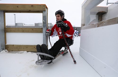 RUTH BONNEVILLE / WINNIPEG FREE PRESS


Dominic Cozzinolino, team Canada paralympic sledge hockey player and Jumpstart ambassador uses the new fully accessible outdoor rink at the Grand Opening  at Dakota Community Centre Tuesday.  

See press release for more info.





Dec 11th, 2018