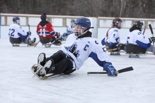RUTH BONNEVILLE / WINNIPEG FREE PRESS


Members of the Collège Jeanne-Sauvé hockey team learn to play hockey on sleds at the Grand Opening of the  Jumpstart  fully accessible outdoor rink at Dakota Community Centre Tuesday.  

See press release for more info.




Dec 11th, 2018