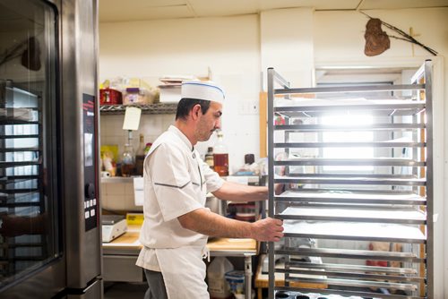 MIKAELA MACKENZIE / WINNIPEG FREE PRESS
Stephane Falieres makes a sponge cake at l'Epi de Ble, a French Bakery, in Winnipeg on Thursday, Dec. 13, 2018. 
Winnipeg Free Press 2018.