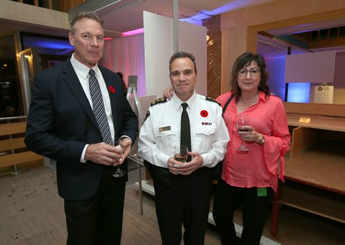 JASON HALSTEAD / WINNIPEG FREE PRESS

L-R: Cam Baldwin (Main Street Project board president), Danny Smyth (Winnipeg Police Chief) and Cynthia Smyth at the Pop Up Soirée sneak-peek event for Main Street Project's new home at the former Mitchell Fabrics building at 637 Main St. on Nov. 8, 2018. (See Social Page)
