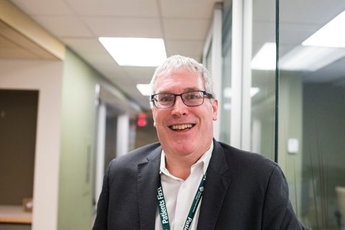 MIKAELA MACKENZIE / WINNIPEG FREE PRESS
Ronan Segrave, the interim CEO of HSC, shows off the new personal alarm devices in Winnipeg on Tuesday, Dec. 18, 2018. 
Winnipeg Free Press 2018.