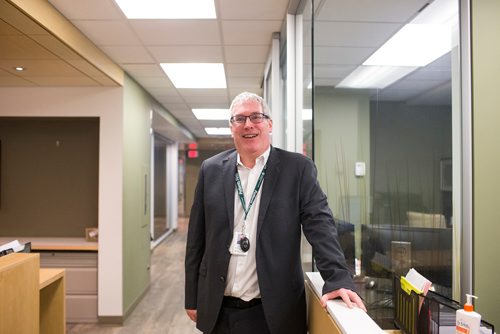 MIKAELA MACKENZIE / WINNIPEG FREE PRESS
Ronan Segrave, the interim CEO of HSC, shows off the new personal alarm devices in Winnipeg on Tuesday, Dec. 18, 2018. 
Winnipeg Free Press 2018.