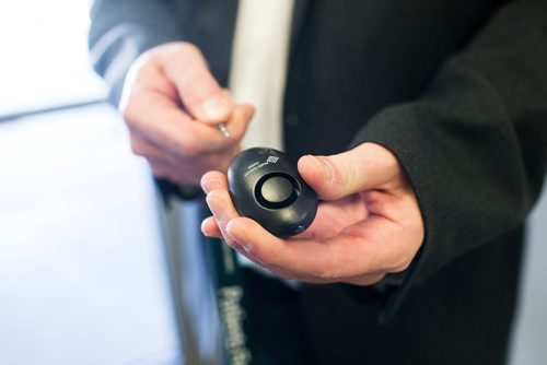 MIKAELA MACKENZIE / WINNIPEG FREE PRESS
Ronan Segrave, the interim CEO of HSC, shows off the new personal alarm devices in Winnipeg on Tuesday, Dec. 18, 2018. 
Winnipeg Free Press 2018.