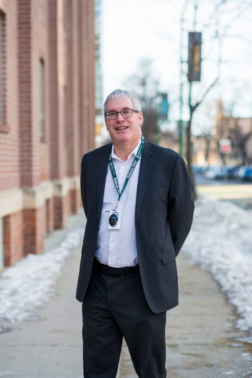 MIKAELA MACKENZIE / WINNIPEG FREE PRESS
Ronan Segrave, the interim CEO of HSC, shows off the new personal alarm devices in Winnipeg on Tuesday, Dec. 18, 2018. 
Winnipeg Free Press 2018.