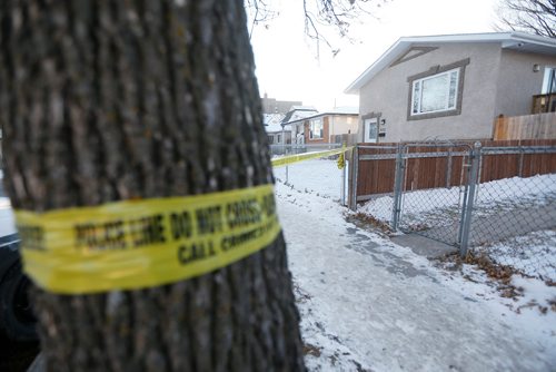 JOHN WOODS / WINNIPEG FREE PRESS
Police tape surrounds 622 McGee Street the scene of Winnipeg's latest murder Tuesday, December 18, 2018.