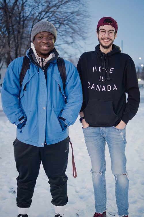Canstar Community News Dec. 5, 2018 - Victory Iyakoregha and Tyrel Praymayer are part of the group of University of Manitoba students who created the OnTheStep snow clearning app. The app connects "steppers" with clients who can order snow clearing service with a touch of a button. The app has employed between 10 and 15 newcomers to the city through the Hire-A-Refugee program, which connects refugees with employment. (DANIELLE DA SILVA/SOUWESTER/CANSTAR)