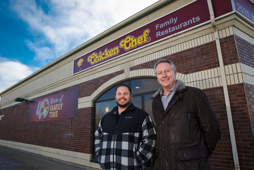 MIKE DEAL / WINNIPEG FREE PRESS
Ryan Thorgilsson (left) and Jeff Epp (right) co-owners of the Chicken Chef chain stand outside the 2539 Main Street restaurant in Winnipeg.
181220 - Thursday, December 20, 2018.