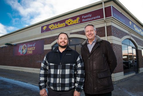 MIKE DEAL / WINNIPEG FREE PRESS
Ryan Thorgilsson (left) and Jeff Epp (right) co-owners of the Chicken Chef chain stand outside the 2539 Main Street restaurant in Winnipeg.
181220 - Thursday, December 20, 2018.