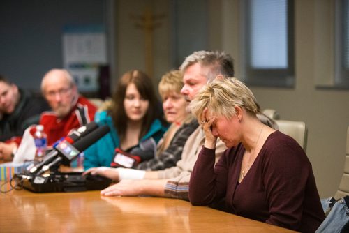 MIKAELA MACKENZIE / WINNIPEG FREE PRESS
Christina Harris puts her head in her hand as her family holds a press conference at the Grace Hospital after their home burned down just days before Christmas in Winnipeg on Friday, Dec. 21, 2018. 
Winnipeg Free Press 2018.
On December 20, 2018, at 1:20 am, Headingley RCMP received a report of a house fire on Park Avenue in Oak Bluff, Manitoba.