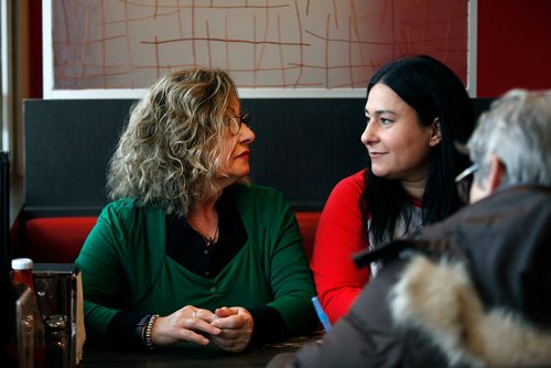 PHIL HOSSACK / WINNIPEG FREE PRESS - Red Top Restaurant owners Vicky Scouras and her daughter Elena exchange emotional looks while sharing the restaurant's history with the Free Press. Alex Paul's story. December 21, 2018.