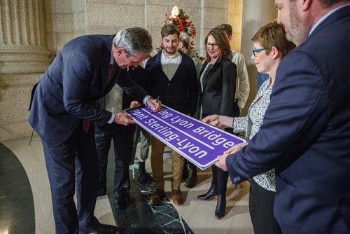 MIKE DEAL / WINNIPEG FREE PRESS
Premier Brian Pallister, Minister Ron Schuler and Nancy (Lyon) Matthews along with extended family were on hand at the Manitoba Legislature to announce the naming of the Trans-Canada Highway bridge over the Assiniboine River in the Rural Municipality of St. Francois Xavier will be named Sterling Lyon Bridge.
181221 - Friday, December 21, 2018.