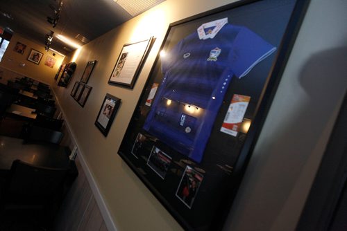 PHIL HOSSACK / WINNIPEG FREE PRESS -     Siam Thai features a jersey signed by members of the Thai national women's soccer team, which made the restaurant their home away from home, a couple years ago during the World Cup. December 21, 2018.