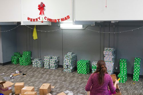 Katie McKenzie / Ma Mawi Wi Chi Itata Centre
Some of the wrapped presents organized and ready to be packed into hampers at Ma Mawi Wi Chi Itata centre for the 16th annual Christmas Hamper Drive hosted by Ma Mawi Wi Chi Itata Centre and Bell MTS.

181221 - Friday, December 21, 2018.