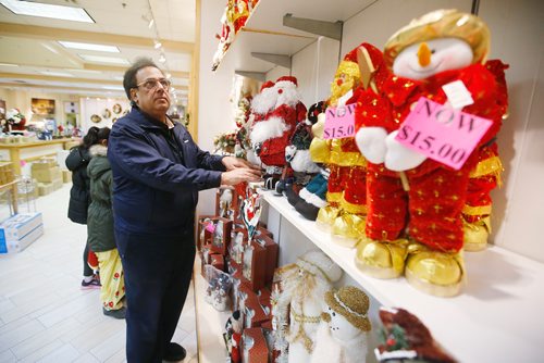 JOHN WOODS / WINNIPEG FREE PRESS
Sam Pardal, owner of a Christmas pop-up store in Garden City Shopping Centre in Winnipeg, stocks shelves and talks about how sales were this year  Sunday, December 23, 2018.