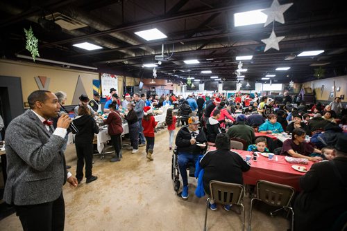 MIKAELA MACKENZIE / WINNIPEG FREE PRESS
The 13th Annual Christmas Eve Feast for new immigrants, international students who cant make it home for the holidays, and people in the inner city at X-Cues Café in Winnipeg on Monday, Dec. 24, 2018. 
Winnipeg Free Press 2018.