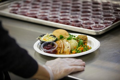 MIKE DEAL / WINNIPEG FREE PRESS
The Siloam Mission Christmas Eve meal serves over 600 people with anywhere from 65-100 volunteers to help make it happen on Monday December 24, 2018.
A plate full of turkey dinner with mashed potatoes, gravy, dressing vegetables, a bun, coleslaw and cranberry sauce.
181224 - Monday, December 24, 2018.