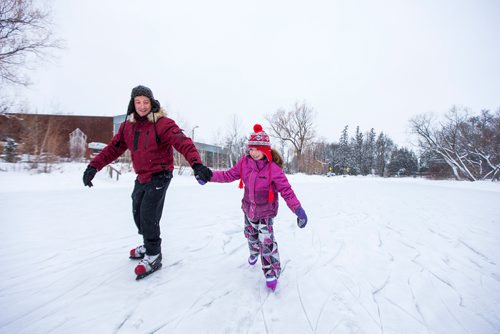 MIKAELA MACKENZIE / WINNIPEG FREE PRESS
Emily Keselman, nine, goes skating with her dad, Tony, in Assiniboine Park on Christmas morning in Winnipeg on Tuesday, Dec. 25, 2018. 
Winnipeg Free Press 2018.