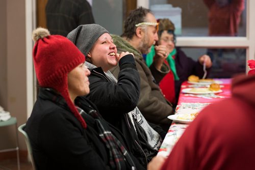 MIKAELA MACKENZIE / WINNIPEG FREE PRESS
Fiona Fontaine laughs while eating at the annual Christmas lunch hosted by the West Broadway Community Ministry and Shaarey Zedek at Crossways in Common in Winnipeg on Tuesday, Dec. 25, 2018. 
Winnipeg Free Press 2018.