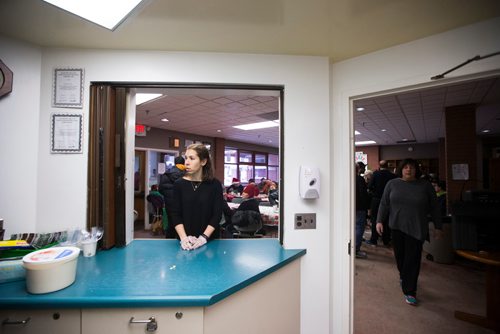 MIKAELA MACKENZIE / WINNIPEG FREE PRESS
Jessica Goldberg waits for more meals to serve at the annual Christmas lunch hosted by the West Broadway Community Ministry and Shaarey Zedek at Crossways in Common in Winnipeg on Tuesday, Dec. 25, 2018. 
Winnipeg Free Press 2018.