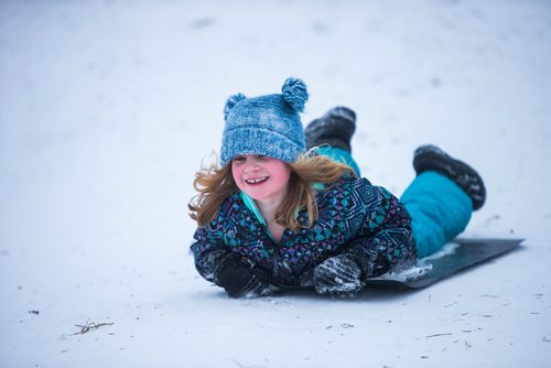 MIKAELA MACKENZIE / WINNIPEG FREE PRESS
Delia King, seven, toboggans at West View Park in Winnipeg on Wednesday, Dec. 26, 2018. 
Winnipeg Free Press 2018.