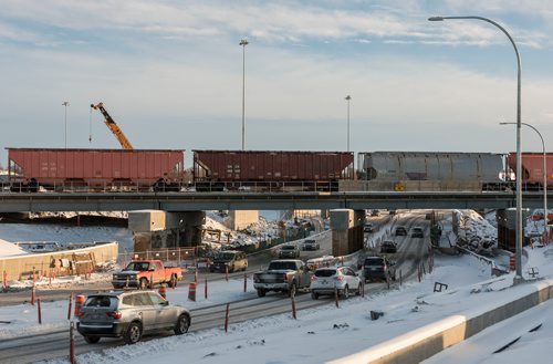 DAVID LIPNOWSKI / WINNIPEG FREE PRESS

A train travels over the Jubilee overpass Thursday December 27, 2018.