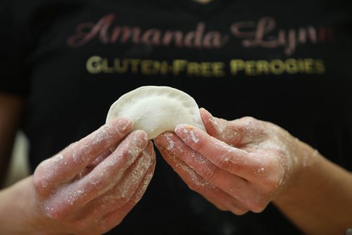 RUTH BONNEVILLE / WINNIPEG FREE PRESS

SANDERSON - Anola


Amanda Lynn DeSutter, owner of Amanda Lynn Gluten Free Perogies, in  Anola Mb. 

Intersection piece, timed for Ukrainian Xmas, on Amanda Lynn DeSutter; photos of Amanda making her gluten-free perogies from scratch including peeling potatoes for filling.  

She started her business 3 years ago and now makes 20 different flavours of gluten-free perogies.  In November she opened up a local food & gift shop in Anola, where she makes and sells her perogies and locally produced products like honey and jam.
Photos of Amanda Lynn in her store, showing off her perogies.  

Some photos taken with her daughter, Chelsea (7yrs).  

Dave Sanderson story

Dec 27th,  2018