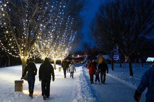 Daniel Crump / Winnipeg Free Press. Skaters and walkers alike brave the elements to enjoy the lights on the freshly opened skating trail at the Forks. December 29, 2018.