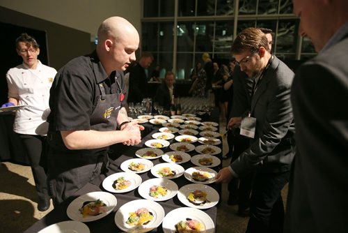 JASON HALSTEAD / WINNIPEG FREE PRESS

Merchant Kitchen chef Jesse Friesen talks to attendees at the Canada's Great Kitchen Party event at the RBC Convention Centre Winnipeg on Nov. 8, 2018. Friesen won the gold medal in the night's culinary competition. (See Social Page)