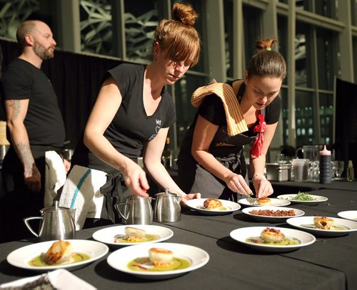 JASON HALSTEAD / WINNIPEG FREE PRESS

L-R: Rachel Isaak helps Hy's Steakhouse chef Jacqueline Hildebrand plate her dish of duck confit steamed buns at the Canada's Great Kitchen Party event at the RBC Convention Centre Winnipeg on Nov. 8, 2018. (See Social Page)