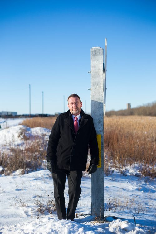 MIKAELA MACKENZIE / WINNIPEG FREE PRESS
Neil Greenslade, a Winnipegger who served as assistant superintendent with Canadian Pacific for three decades, poses by the tracks in Winnipeg on Monday, Dec. 31, 2018. 
Winnipeg Free Press 2018.