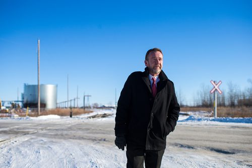 MIKAELA MACKENZIE / WINNIPEG FREE PRESS
Neil Greenslade, a Winnipegger who served as assistant superintendent with Canadian Pacific for three decades, poses by the tracks in Winnipeg on Monday, Dec. 31, 2018. 
Winnipeg Free Press 2018.