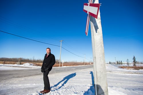 MIKAELA MACKENZIE / WINNIPEG FREE PRESS
Neil Greenslade, a Winnipegger who served as assistant superintendent with Canadian Pacific for three decades, poses by the tracks in Winnipeg on Monday, Dec. 31, 2018. 
Winnipeg Free Press 2018.