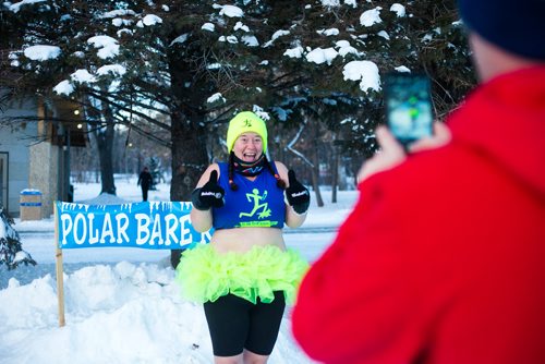 MIKAELA MACKENZIE / WINNIPEG FREE PRESS
Coral Wiebe poses for photos before the annual New Year's Day Polar Bare Run at Assiniboine Park in Winnipeg on Tuesday, Jan. 1, 2019. Winnipeggers braved the weather despite extreme cold warnings.
Winnipeg Free Press 2018.