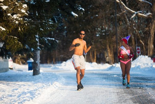 MIKAELA MACKENZIE / WINNIPEG FREE PRESS
Winston Harding (left) and Clemus Laurila celebrate the finish at the end of the New Year's Day Polar Bare Run at Assiniboine Park in Winnipeg on Tuesday, Jan. 1, 2019. 
Winnipeg Free Press 2018.