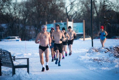 MIKAELA MACKENZIE / WINNIPEG FREE PRESS
Winnipeggers tough it out in little clothing despite the extreme cold warning at the annual New Year's Day Polar Bare Run at Assiniboine Park in Winnipeg on Tuesday, Jan. 1, 2019. 
Winnipeg Free Press 2018.