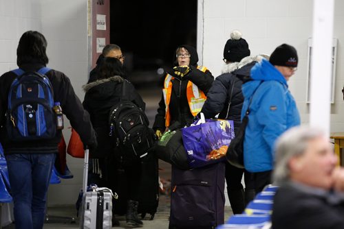 JOHN WOODS / WINNIPEG FREE PRESS
Joy Boucher, a professional driver for 25+yrs, talks with riders at the Maple Bus Lines (MBL) depot on Sherbrook St in Winnipeg Tuesday, January 1, 2019. MBL now serves northern communities after Greyhound stopped all service.