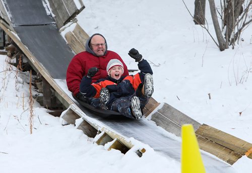 RUTH BONNEVILLE / WINNIPEG FREE PRESS

Families take advantage of the warmer weather and go sliding at Fort Whyte during their winter holidays on Wednesday.

Names: Lucas Ofenloch (11yrs) and his dad Roland laugh as they toboggan together at Fort Whyte Wednesday. 


Standup photo 

Jan 02, 2019