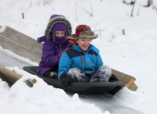 RUTH BONNEVILLE / WINNIPEG FREE PRESS

Families take advantage of the warmer weather and go sliding at Fort Whyte during their winter holidays on Wednesday.

Names: Summer (6yrs) and Riley Tait (8yrs),  whip down the toboggan run onto the lake at Fort Whyte Wednesday. 


Standup photo 

Jan 02, 2019