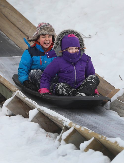 RUTH BONNEVILLE / WINNIPEG FREE PRESS

Families take advantage of the warmer weather and go sliding at Fort Whyte during their winter holidays on Wednesday.

Names: Summer (6yrs) and Riley Tait (8yrs),  whip down the toboggan run onto the lake at Fort Whyte Wednesday. 


Standup photo 

Jan 02, 2019