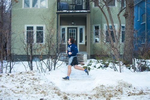 MIKAELA MACKENZIE / WINNIPEG FREE PRESS
Brady Arnason runs in shorts down Stradbrook Avenue in Winnipeg on Thursday, Jan. 3, 2019. 
Winnipeg Free Press 2018.