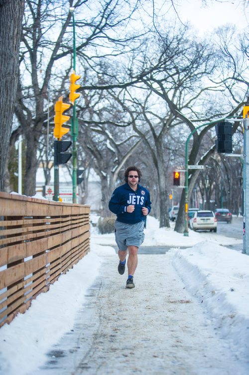 MIKAELA MACKENZIE / WINNIPEG FREE PRESS
Brady Arnason runs in shorts down Stradbrook Avenue in Winnipeg on Thursday, Jan. 3, 2019. 
Winnipeg Free Press 2018.