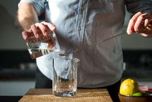 MIKAELA MACKENZIE / WINNIPEG FREE PRESS
Josey Krahn makes an old fashioned at his home bar in Winnipeg on Thursday, Jan. 3, 2019. 
Winnipeg Free Press 2018.