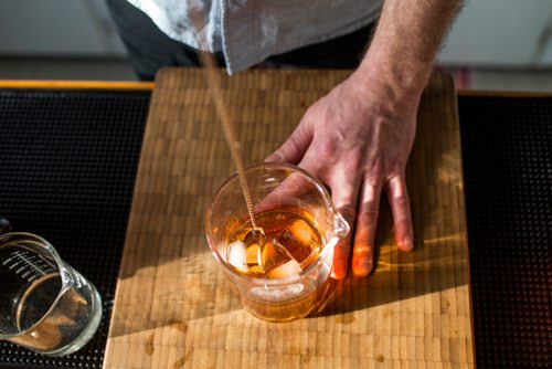 MIKAELA MACKENZIE / WINNIPEG FREE PRESS
Josey Krahn makes an old fashioned at his home bar in Winnipeg on Thursday, Jan. 3, 2019. 
Winnipeg Free Press 2018.