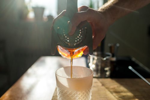 MIKAELA MACKENZIE / WINNIPEG FREE PRESS
Josey Krahn makes an old fashioned at his home bar in Winnipeg on Thursday, Jan. 3, 2019. 
Winnipeg Free Press 2018.