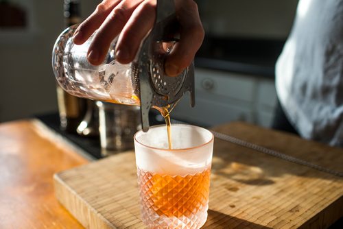 MIKAELA MACKENZIE / WINNIPEG FREE PRESS
Josey Krahn makes an old fashioned at his home bar in Winnipeg on Thursday, Jan. 3, 2019. 
Winnipeg Free Press 2018.