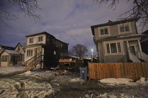 MIKE DEAL / WINNIPEG FREE PRESS
A fire destroyed a house at 905 Manitoba Ave and cause significant damage to the houses on either side of it early Friday morning. Winnipeg Fire Paramedic Service have reported no injuries. 
190104 - Friday, January 4, 2019